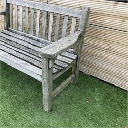 Solid teak two seat garden bench  - THIS LOT IS TO BE COLLECTED BY APPOINTMENT FROM DUGGLEBY STORAGE, GREAT HILL, EASTFIELD, SCARBOROUGH, YO11 3TX