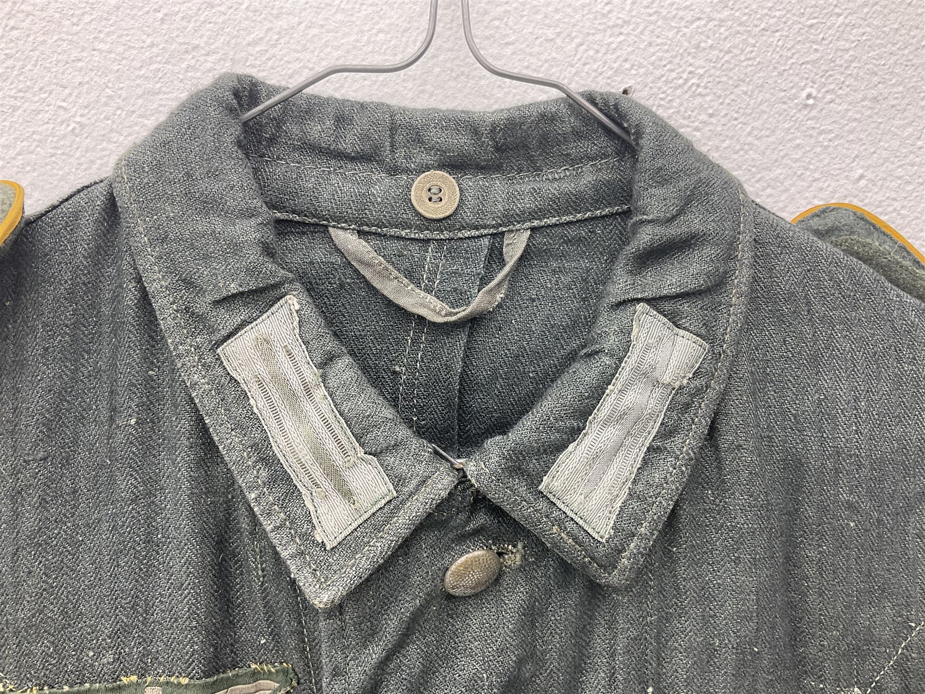 WW2 German Army grey/green herringbone twill four pocket tunic with shoulder tabs for signals regiment, cloth eagle insignia and iron cross ribbon