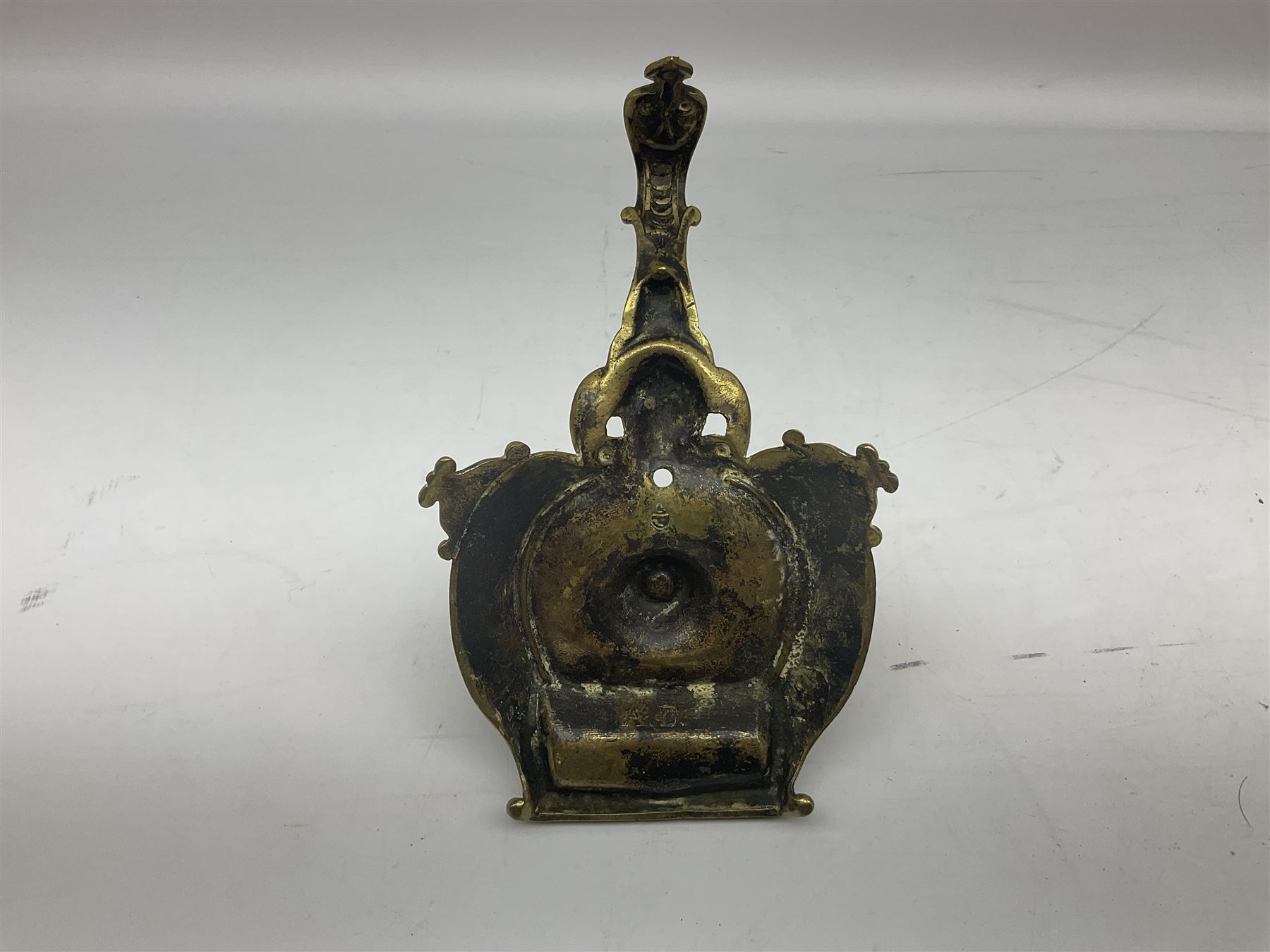 Collection of victorian and later brass desk accessories, to include a letter holder with cherub design, ink well of square form with hinged lid, brass table bell, brass casket with relief decoration, etc  