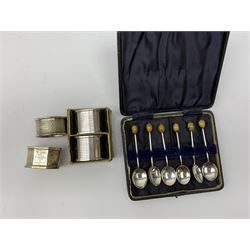 Two silver napkin rings by Collingwood & Sons Ltd, Birmingham 1928 and two other silver napkin rings hallmarked, approx 3.2oz, cased set of silver silver handled knives, hallmarked Sheffield 1915, together with a selection of silver plated flatware, to include Walker and Hall fish eaters set, cased nut cracker set with grape scissors, etc., plus a silver mounted hair brush and hand held mirror, hallmarked Chester 1919