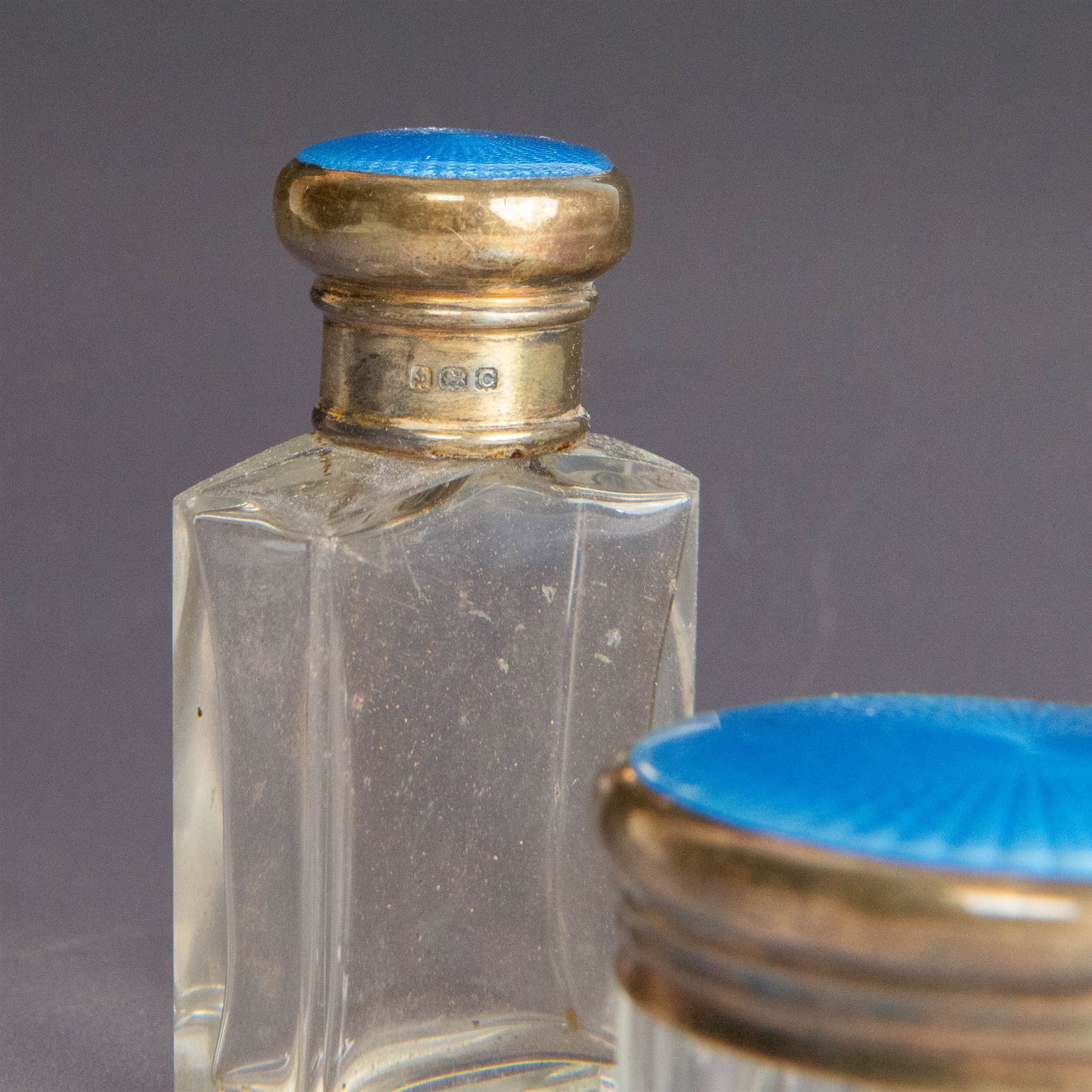 1920s silver mounted blue guilloche enamel travelling dressing table set, comprising hairbrush, comb, bottle and jar, hallmarked RWF Ltd, Birmingham 1927, contained withing tooled leather fitted case with bevelled mirror to interior