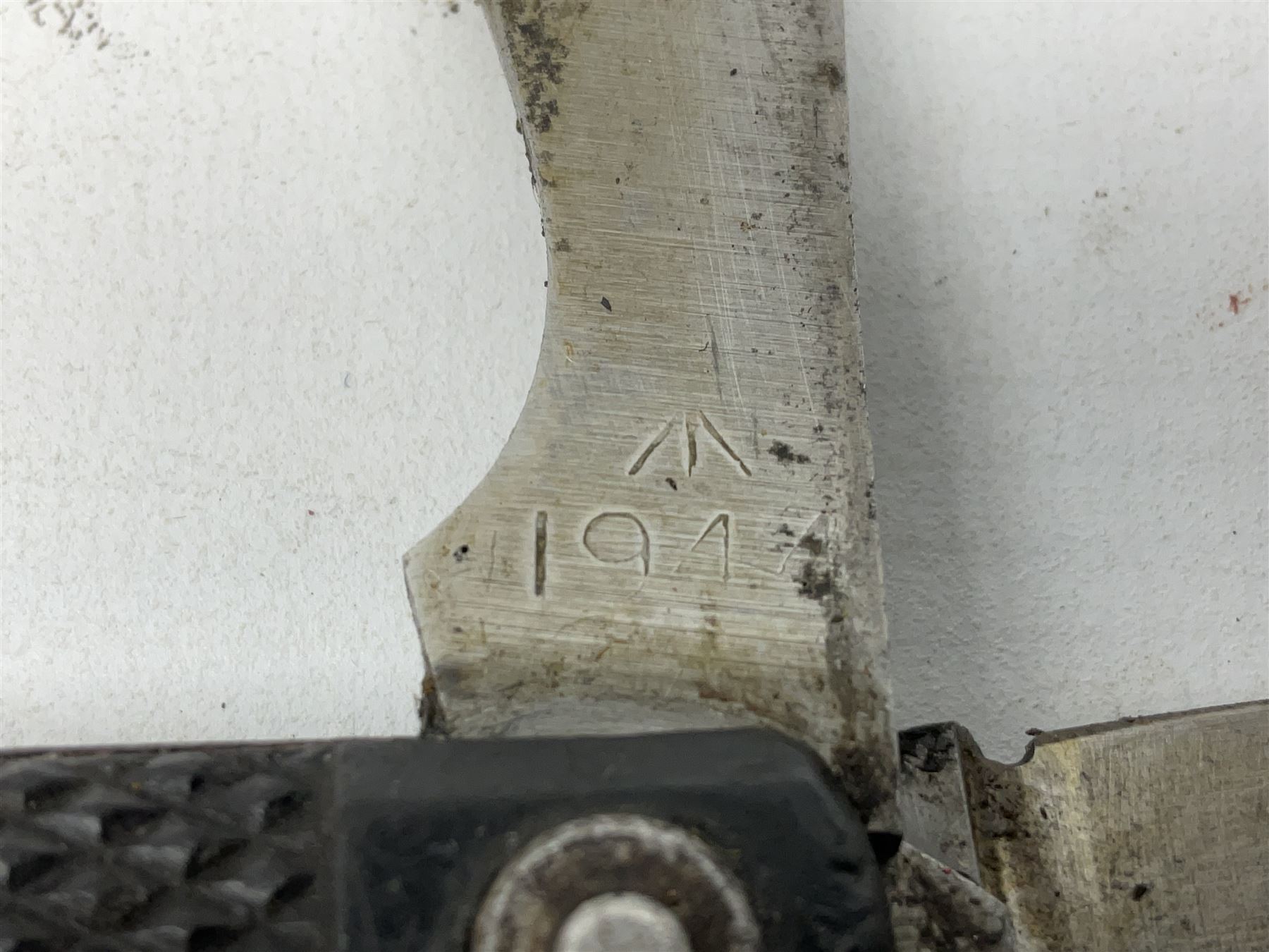 WW2 British army folding jack/clasp knife with blade and can opener marked with broad arrow and date 1944; a similar unmarked British army folding three-blade knife; and another later similar British Army knife marked Wade & Butcher Sheffield England (3)