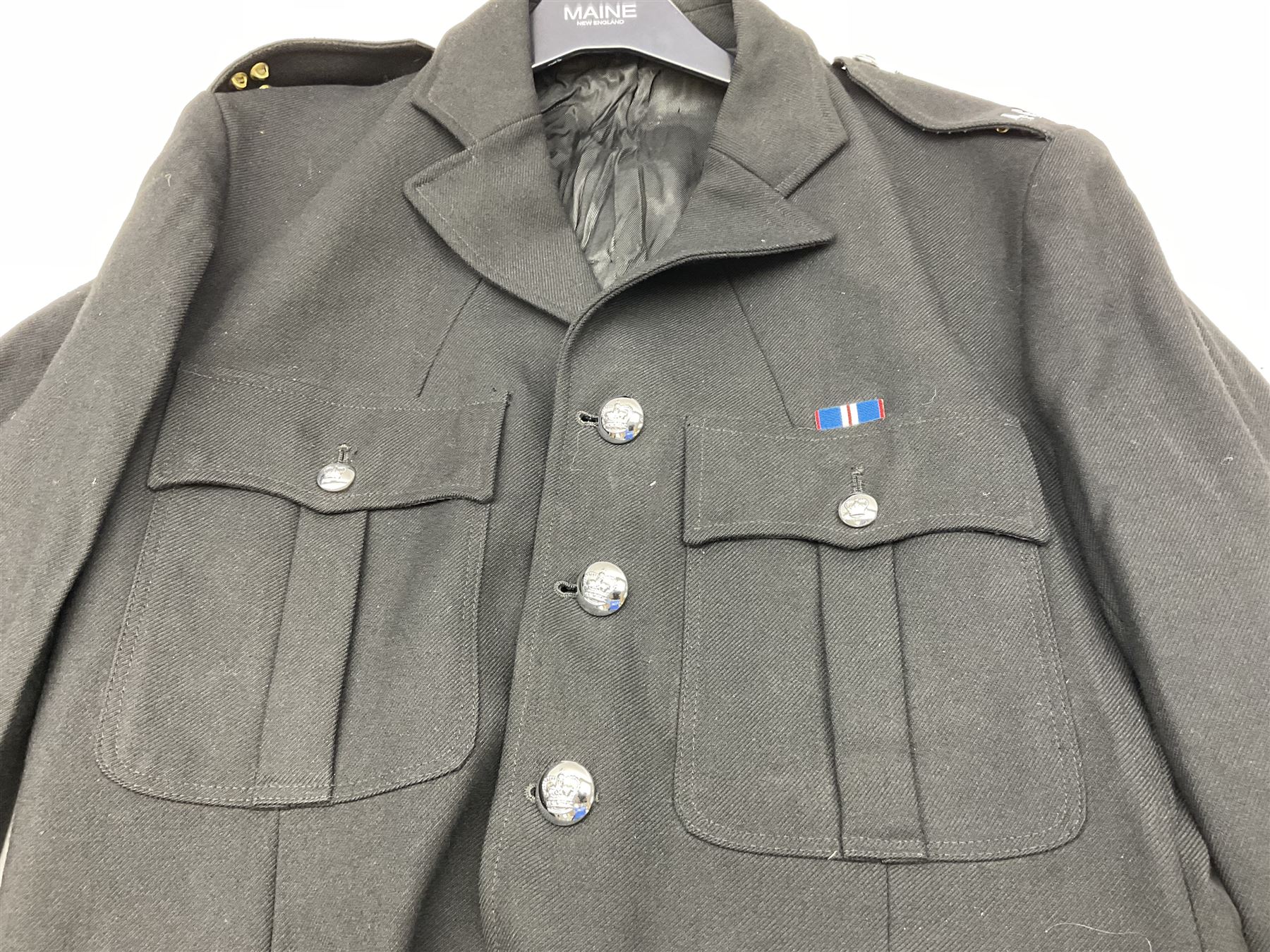 LNER Police cape; indistinctly dated 1943(?); York & North East Yorkshire Police belted tunic; belted tunic with Chief Constable epaulettes and buttons; and another tunic with staybrite Queens Crown buttons (4)