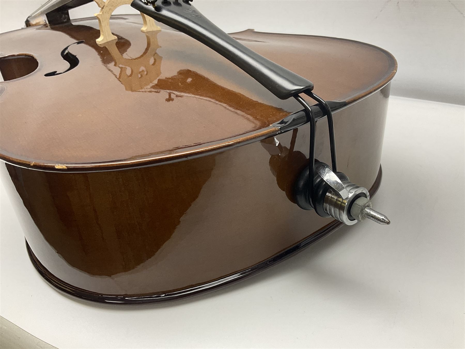 Stentor Student I quarter-size cello with 59.5cm two-piece maple back and ribs and spruce top; bears maker's label with serial no.M072648 L95.5cm overall; in Stentor soft carrying case with bow