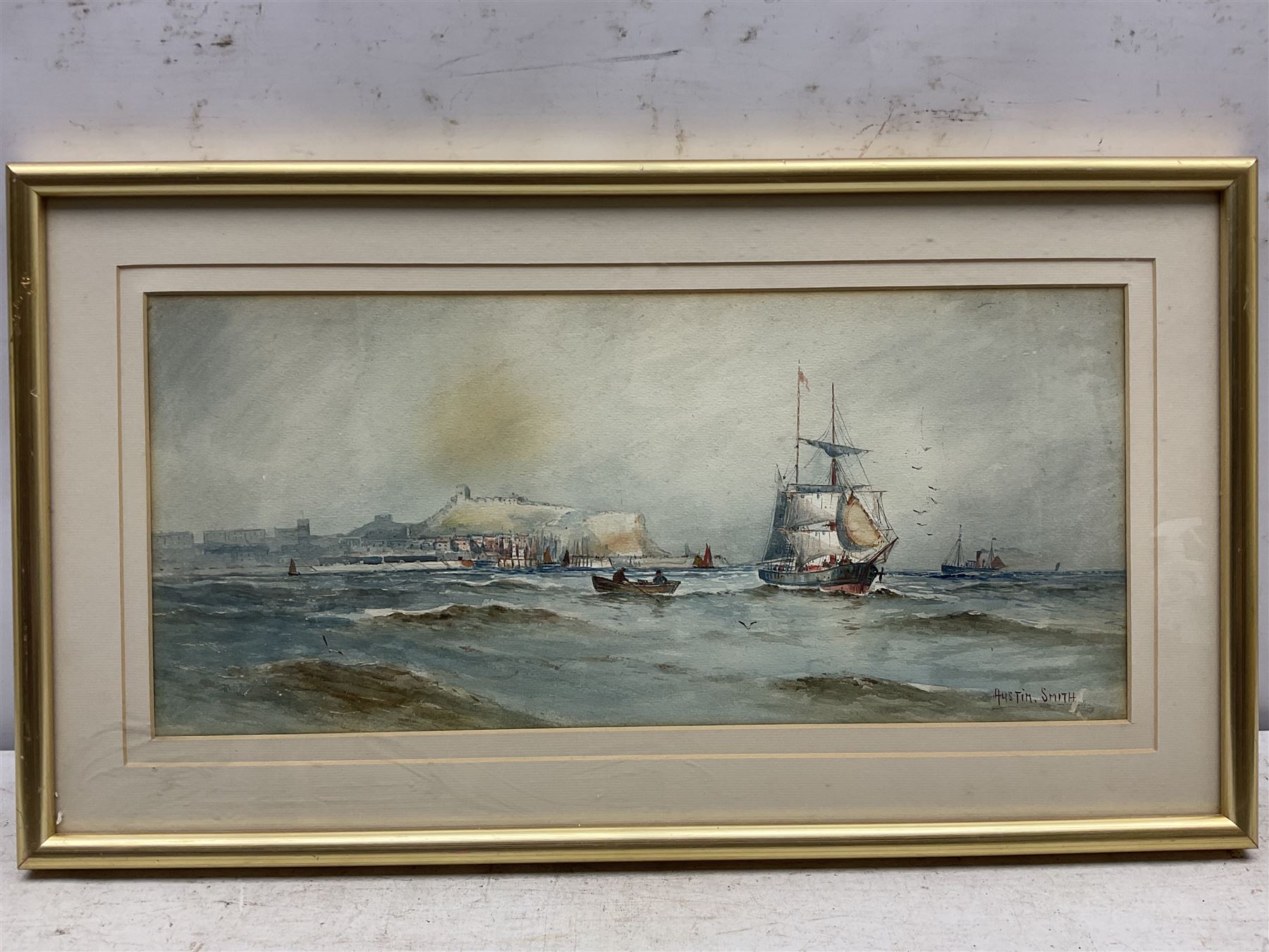 Austin Smith (British early 20th century): Shipping off Scarborough, watercolour signed 21cm x 47cm