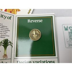 Two Great Britain and Northern Island proof sets dated 1970 and 1971, both with card cases, three 1986 Commonwealth Games commemorative two pound coins, in card folders, and six brilliant uncirculated one pound coins, in card folders