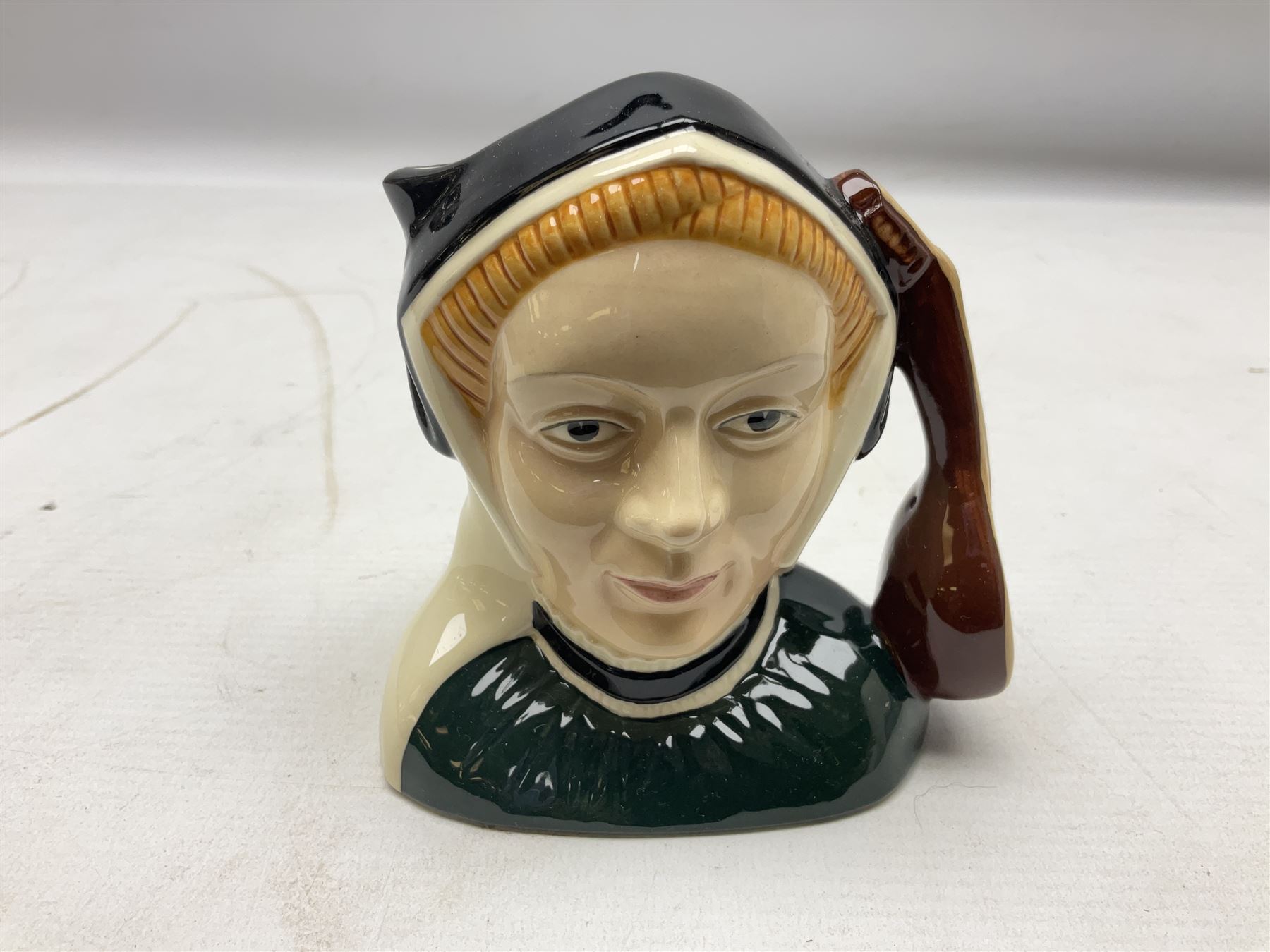 Royal Doulton Henry VIII and his Six Wives Character Jugs, comprising of Henry VIII D6647, Catherine of Aragon D6657, Anne Boleyn D6650, Jane Seymour D6746, Anne of Cleves D6753, Catherine Howard D6692 and Catherine Parr D6751, tallest H10cm