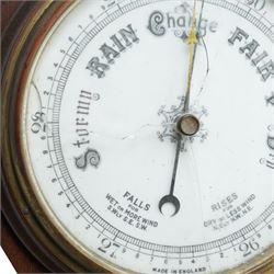 Aneroid barometer and thermometer in carved oak case