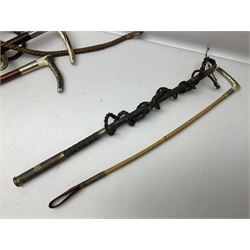 Collection of hunting crops and riding whips, including horn handle examples with silver cuffs