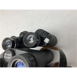 Eleven cased pairs of binoculars to include Summit 8x30,  Concord 8x40, Tasco no. 106 8x - 16x40, Chinon 10x50, Tokina 7x42 Field, Zoom 6x- 12x32 etc