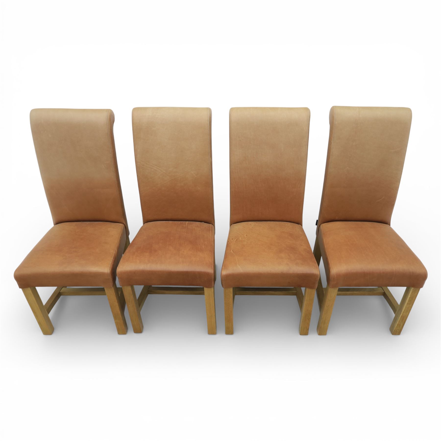 Modern large oak plank top dining table and twelve brown leather high back chairs, table of rustic construction five solid planks with exposed supports, the chairs in brown leather hide with ten standard height and a pair of taller chairs for the foot and head of the table