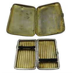 Early 20th century silver cigar case, of rounded rectangular form, with engine turned decoration and vacant circular plaque to front, hallmarked John Edward Wilmot, Birmingham 1909, H14cm, together with a late Victorian reeded cigarette case, hallmarked Birmingham 1896, maker's mark L.B, H9cm, approximate total weight 8.32 ozt (259 grams)