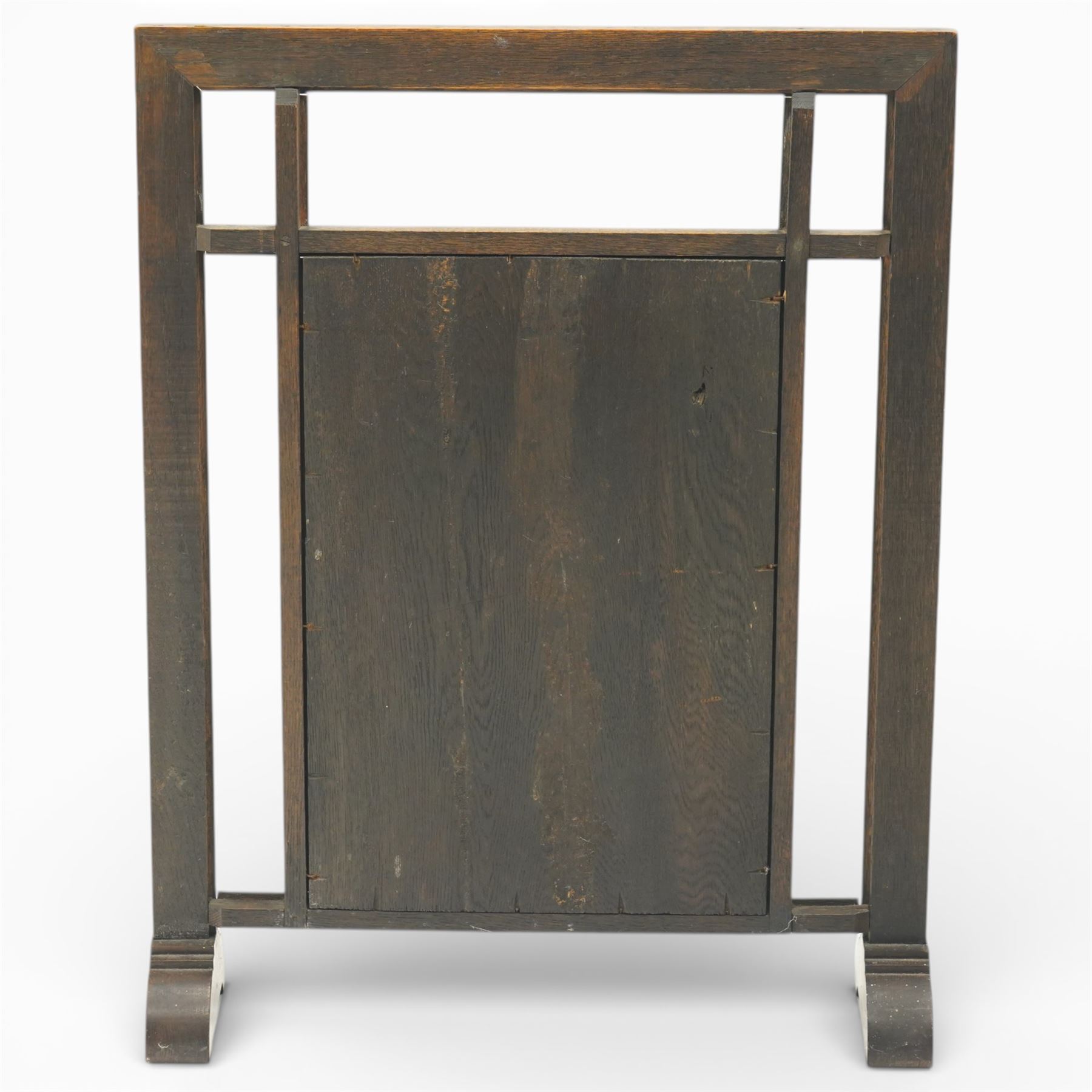 20th century carved fireside accessories; a carved coal bucket with metal liner and a carved fire screen