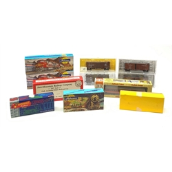 HO scale - four Kadee Cars boxcar wagons, in plastic display boxes; InterMountain Railway Company 8000 gallon tank car; three other plastic boxcars by Athearn, Roundhouse etc; Athearn Standard Pullman coach and Observation car for assembly; and Con-Cor Milwaukee passenger coach, all boxed (11)