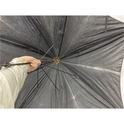 Early 20th century curved horn handle walking stick with hallmarked silver mounts, engraved L Russell 1918, together with a shooting stick by William Mills Birmingham, with leather handle, 'The Featherwaite' shooting stick and an umbrella with wooden handle