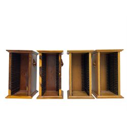 Unicornman - yew wood cabinet, moulded hinged lid over two panelled doors and shelves (W56cm, H99cm, D45cm); and four Unicorn man CD racks two in yew wood and two in oak (W20cm, H36cm, D20cm); all carved with unicorn signature and by Geoff Gell, Coxwold
