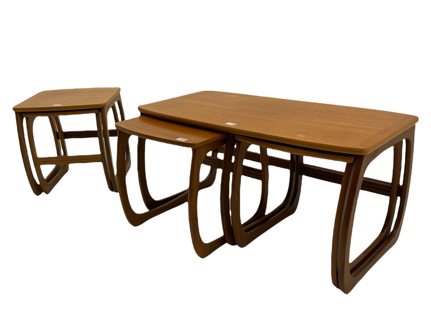 Nathan - teak Long John nest of tables and a singular nest of tables 
