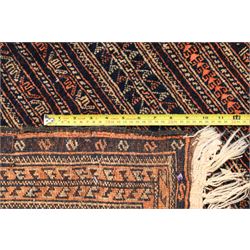 North Persian indigo ground tribal rug, the field decorated with stylised geometric motifs within vertical rows, the guard stripes with repeating hook motifs