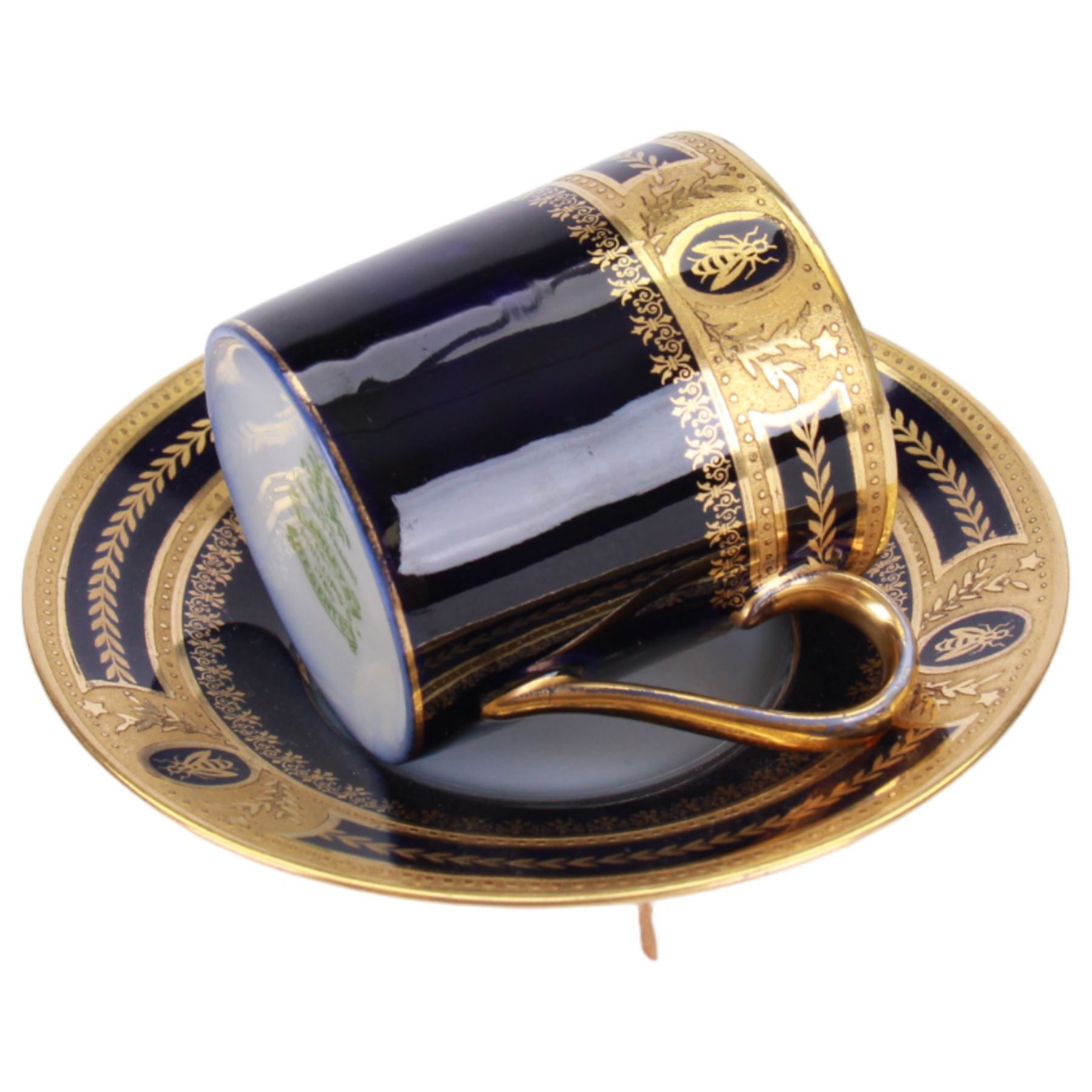 Limoges Coffee can and saucer, jug and open sucrier, all decorated with gilt boarder and decorated with bees framed with laurel leaves, with makers mark beneath