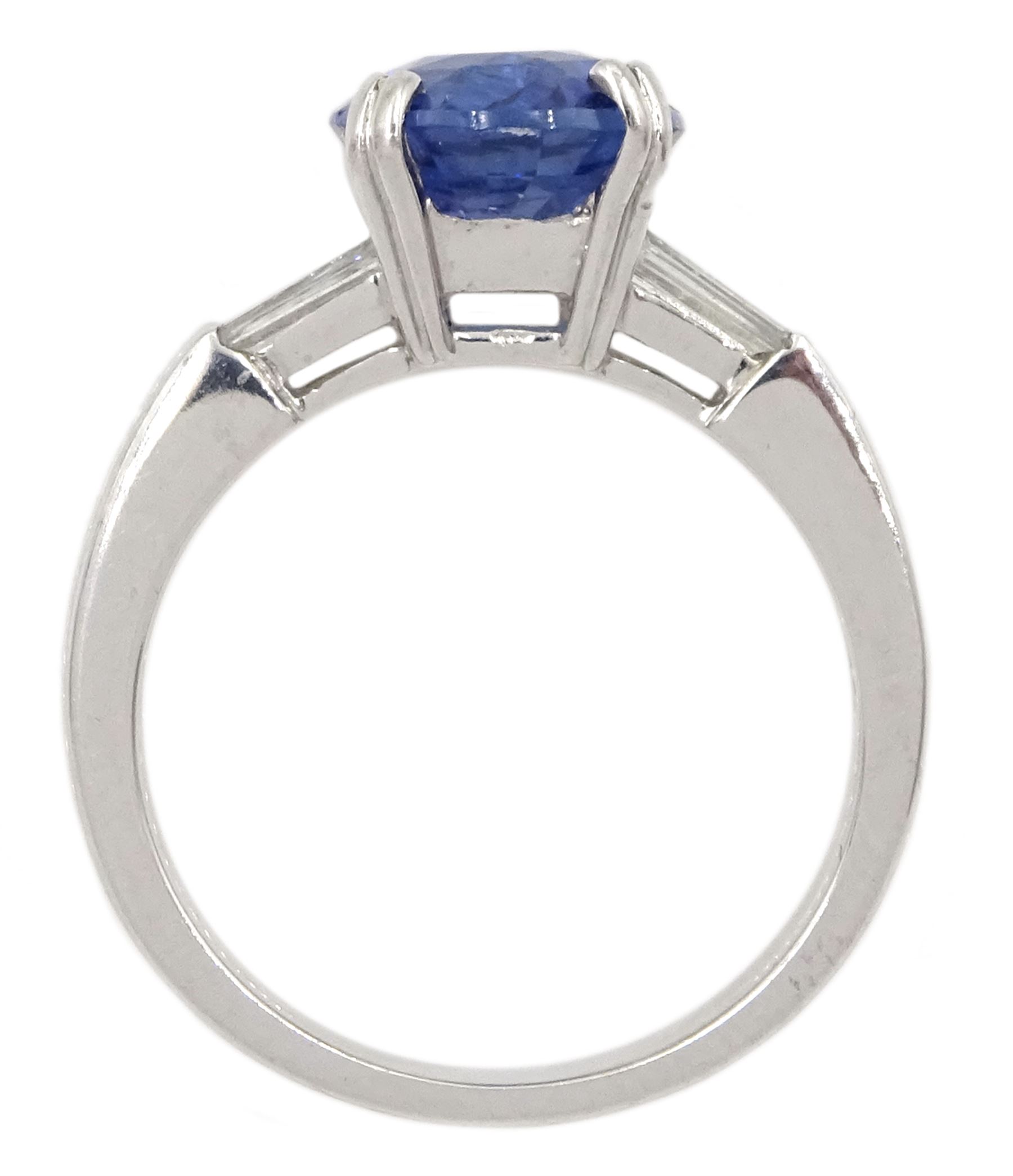 18ct white gold oval sapphire ring, with tapered baguette diamond shoulders, sapphire approx 4.15 carat