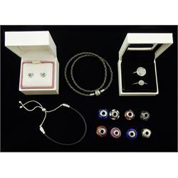 Collection of Pandora jewellery including two silver stone-set rings, one pair of stone-set heart stud earrings, eight Pandora charms, etc.