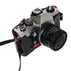 Three 35mm film SLR cameras, comprising Canon EOS 50E camera body with a Canon Ultrasonic EF 28-80mm 1:3.5-5.6 lens, together with a Canon EOS 600 camera body with a Sigma UC 28-70mm 1:3.5-4.5 lens and a Praktica MTL5 with a Carl Zeiss Jena DDR MC Flektogon 2.4/35 lens