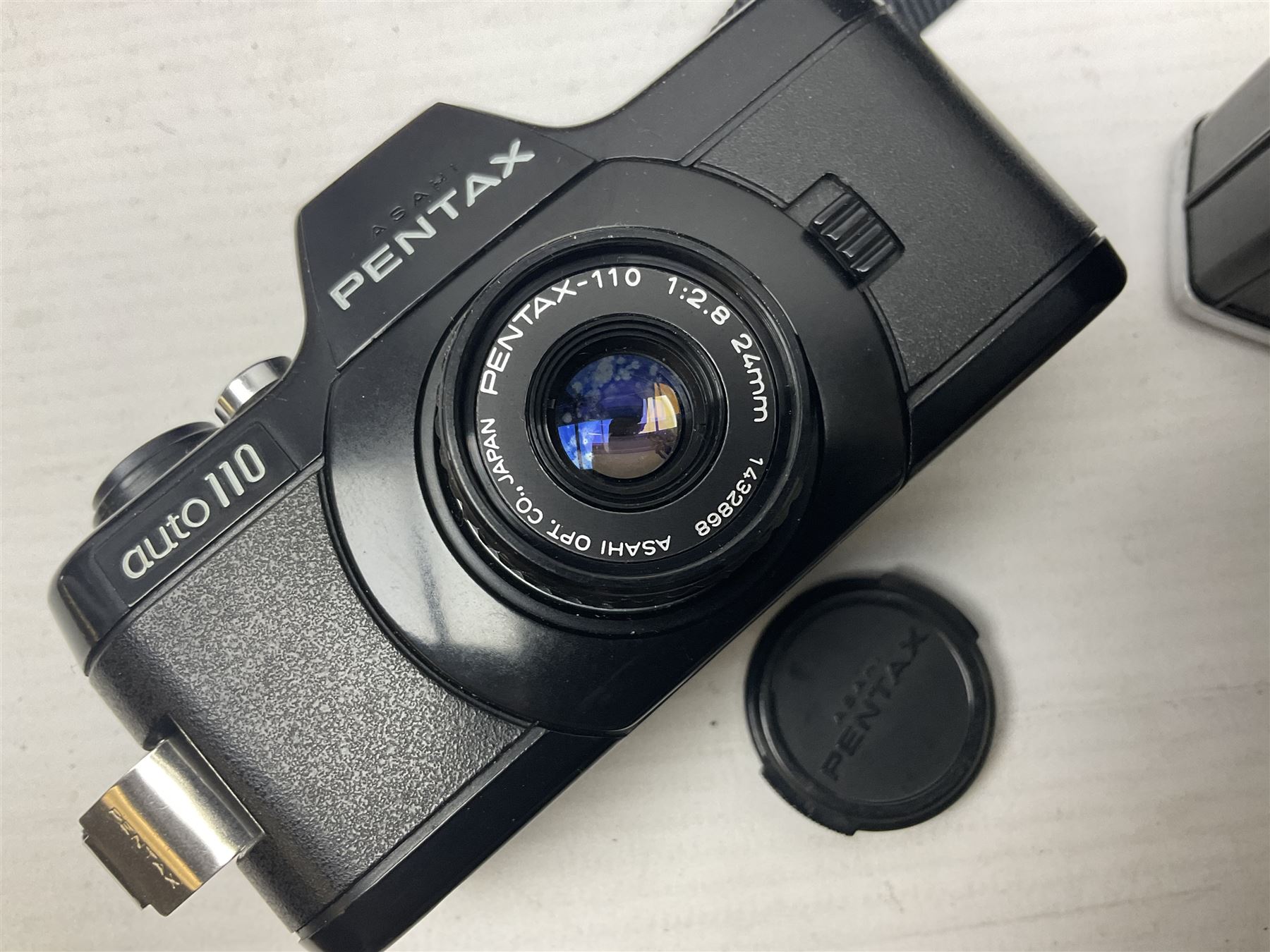 Collection of cameras and lenses, to include Pentax Program A camera body, serial no 123759, with 'Pentax-A zoom 1:3.5-4.5 28-80mm' len, Praktica EE2 camera body with 'Pentacon electric 1.8/50' lens etc, together with a Manfrotto tripod 