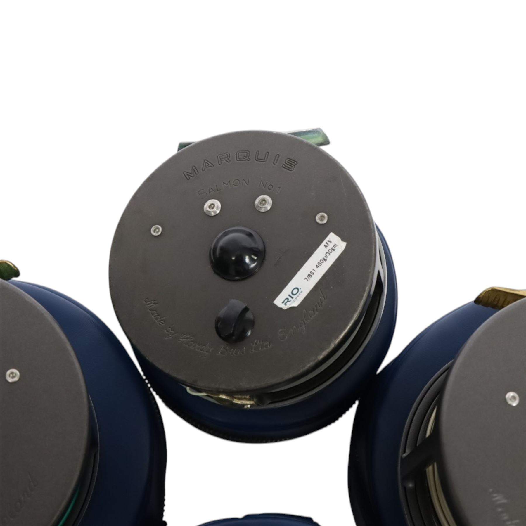 Four Hardy Bros Marquis fly fishing reels, comprising three No. 3 salmon reels and a No.1 Salmon reel, all within blue Hardy cases