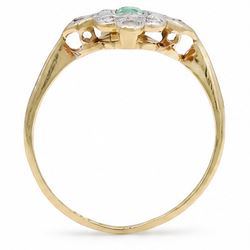 Early 20th century gold and platinum emerald and diamond panel ring, single rectangular cut emerald, surrounded by eight single cut diamonds, stamped 18ct & PT