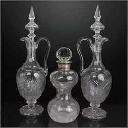 Silver topped crystal decanter of twisted form, hallmarked M Chapman, Son & Co Ltd, London...