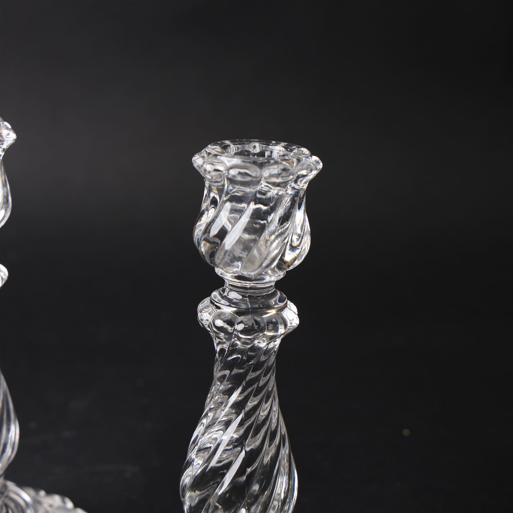 Pair of Baccarat Bambous glass candlesticks, with wrythen moulding, marked beneath, H19cm