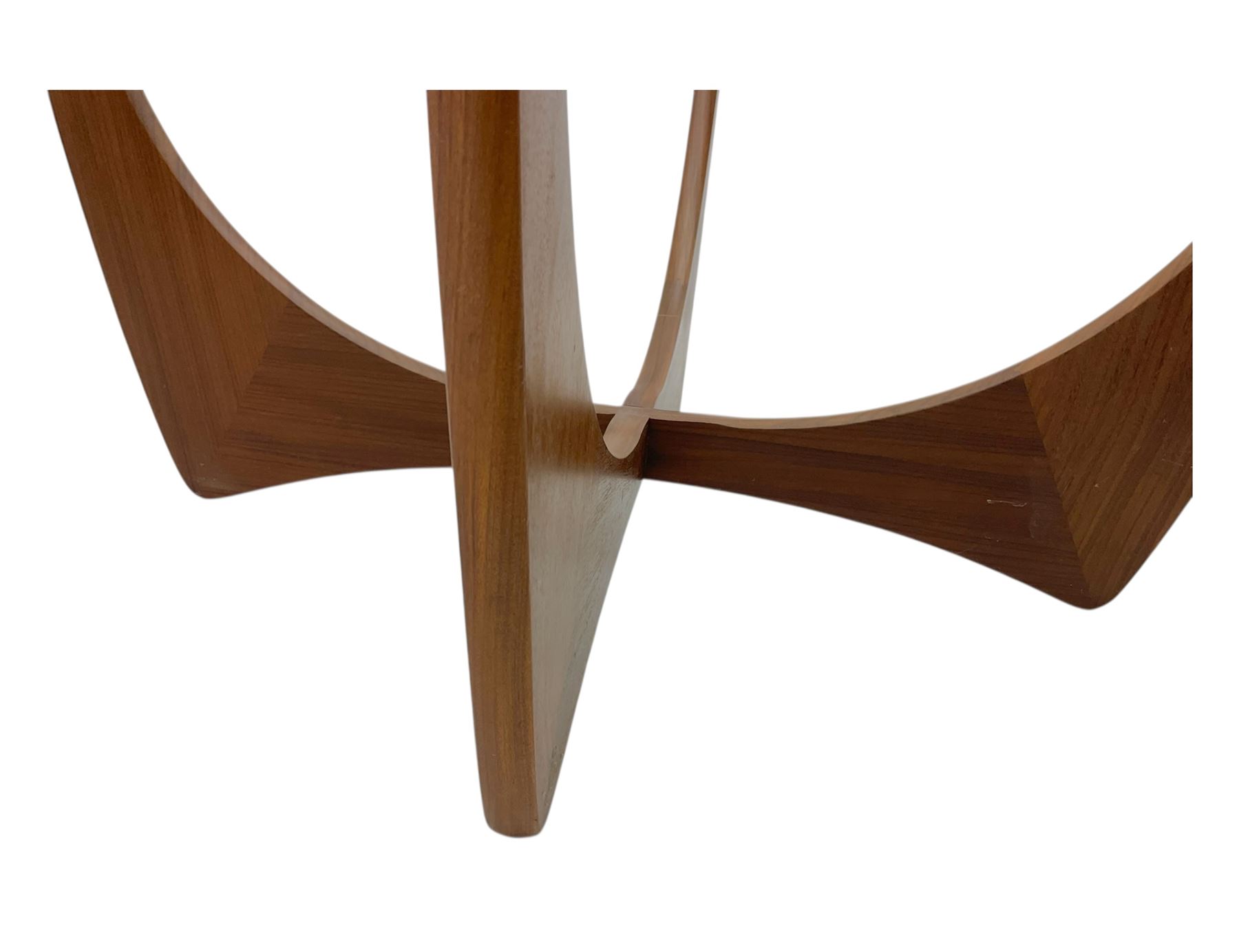 G Plan - Mid-century teak coffee table, circular form with inset glass top within a wide chamfered teak border, on sculptural cruciform base with curved intersecting supports