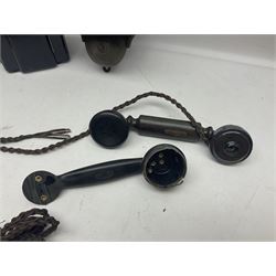 Collection of phone headsets, including GPO bakelite examples, together with other telephone parts 