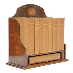 Edwardian Asprey mahogany desktop book trough, the segmental arched back with inlaid fan patera and serpentine shaped sides, above single recess and moulded base rail, housing Asprey & Co Ltd leather bound reference library, comprising Dictionary, French and English Dictionary, English Quotations and Proverbs, Classics and Mythology, Encyclopedia, French and Latin Quotations, Gazetteer, and Atlas, book trough, 22cm x 22.5cm x 11cm
