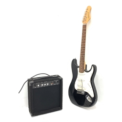 An Elevation electric guitar, together with a Clarity JE22 amplifier. 