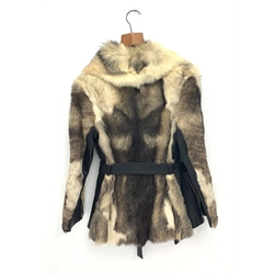 A lined Ocelot fur jacket with leather trim and belt. 