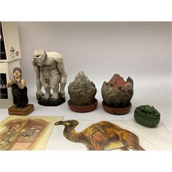 Terry Pratchett Discworld figures, designed by Clarecraft, comprising Death and Granny Weatherwax, DW90, Deathhead DWE8, Dried-frog pill box, boxed, DW63, Death as Beau Nidle, boxed, DW88, Agnes Nitt DW68, Detritus, DW22, Bonsai mountain, DW78, Volcanic bonsai mountain, boxed, DW79, Bonsai mountain valley, DW80, together with the Discworld mapp, and a collection of Terry Pratchett cards.  