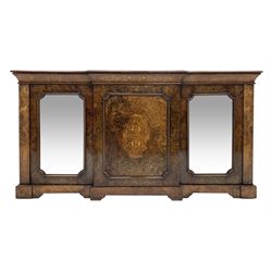 Victorian figured walnut breakfront credenza, moulded top with book matched veneers over cavetto frieze inlaid with box wood scrolls and stringing, central panelled door with inlays flanked by two mirror glazed doors, on plinth base