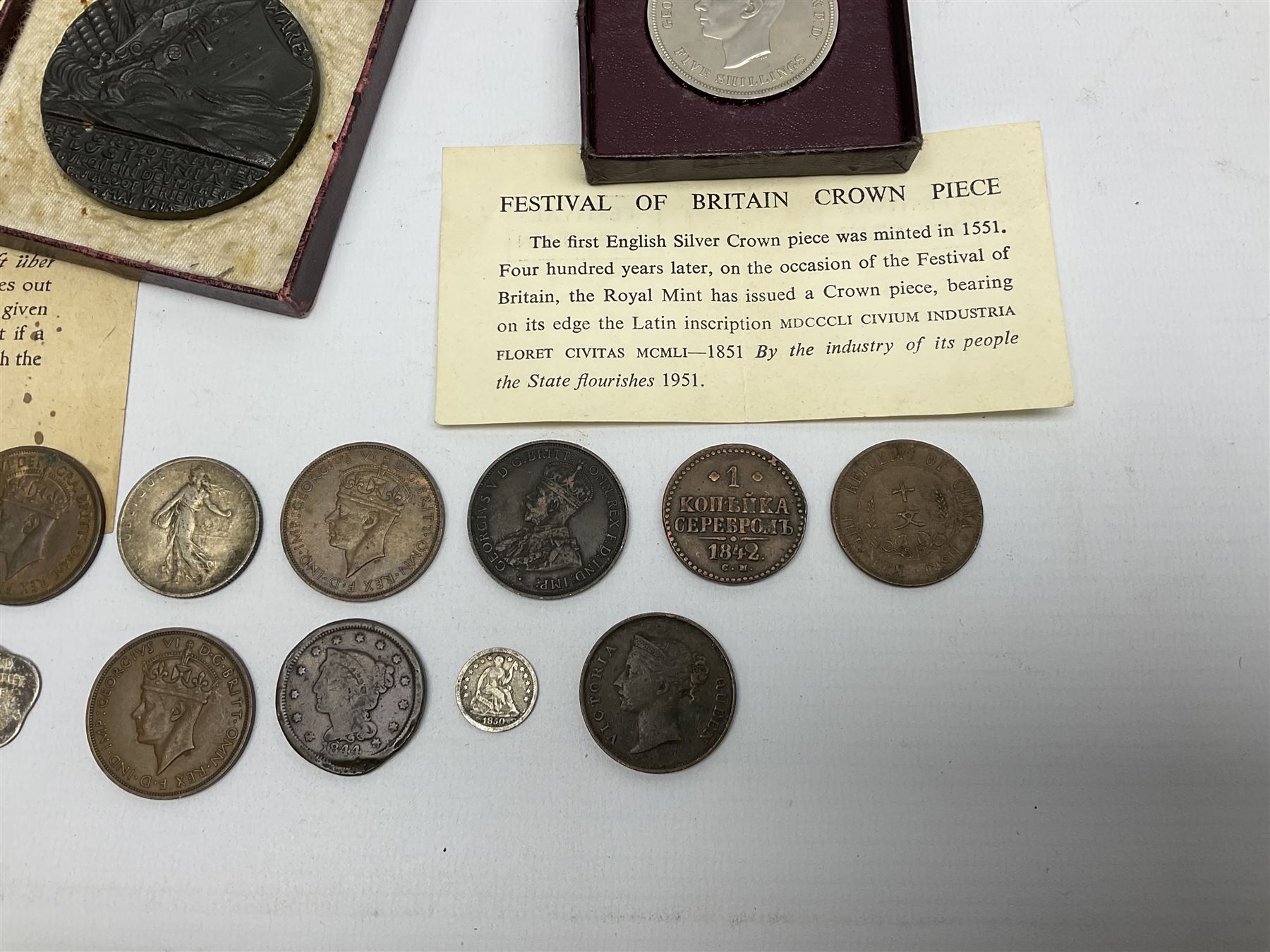 Lusitania replica medal, boxed and various coins including King George VI 1951 Festival of Britain crown, United States of America 1844 one cent and 1850 half dime, Queen Victoria States of Jersey 1844 one thirteenth of a shilling, etc