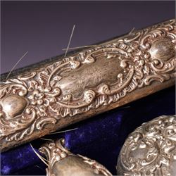 Victorian silver backed six piece dressing table set  with embossed decoration and engraved with initials in original case Chester 1900 Maker Charles Cooke