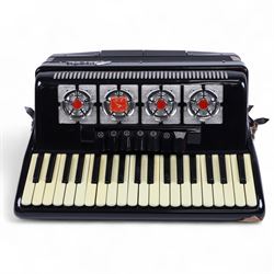 Bai-Le-20th century Chinese Piano Accordion, three octave keyboard with 96 treble buttons and 7 base keys, 16-fold bellows with shoulder straps and hard carrying case.