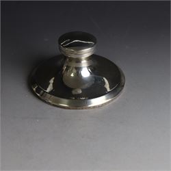 Edwardian silver fall-front ring box with loop handle, opening to reveal velvet interior with five ring spaces, hallmarked Deakin & Francis, Birmingham 1907, together with a cut glass jar with silver lid inscribed 'Hair Tidy' and a silver mounted capstan inkwell, both hallmarked 