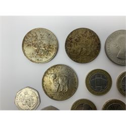 Queen Elizabeth II commemorative coins, including three Isle of Man 1970 crown coins, two further UK 1965 and 1970 crowns, three 2017 ‘Benjamin Bunny’ fifty pence pieces, two 1999 ‘Rugby World Cup’ two pound coins, Isle of Man 1999 ‘Phillip McCallen’ fifty pence piece etc