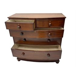 19th century mahogany bow-front chest, fitted with two short over four graduating long drawers, each with cock-beaded facias and turned wood handles, raised on bun feet
