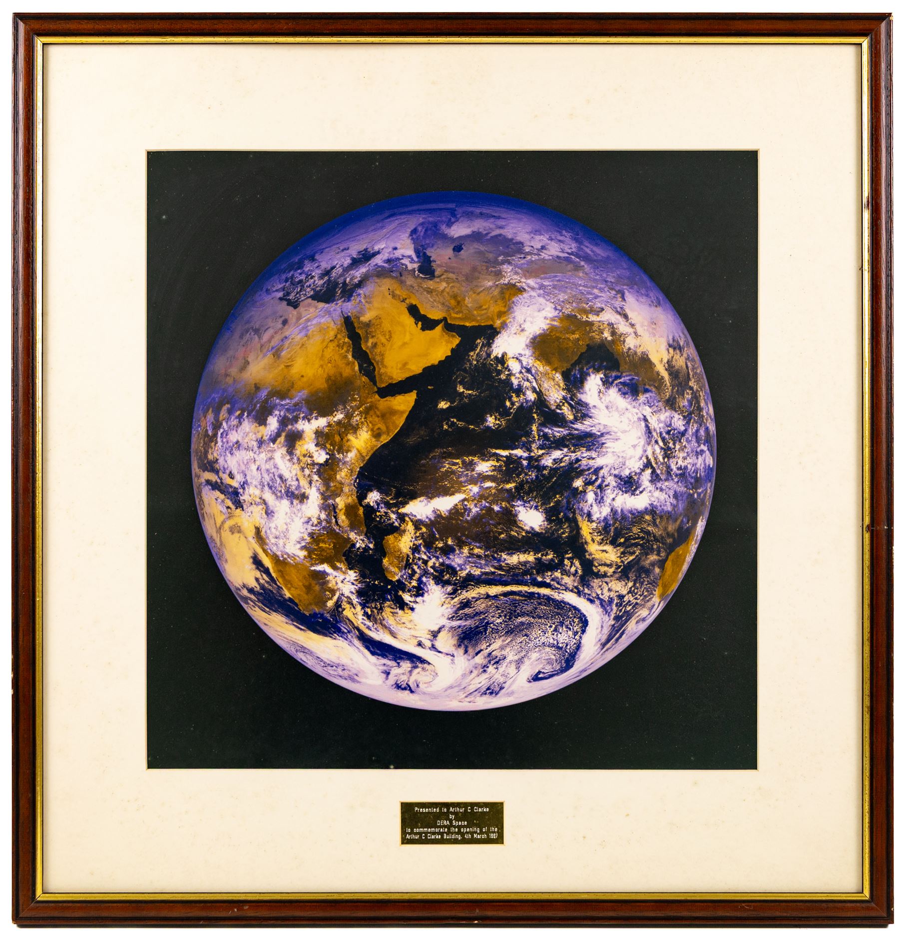 Stanley McMurtry (Mac) (British 1936-) original cartoon presented to Arthur C Clarke by the artist and the Daily Mail 1996, together with other items gifted to Arthur C Clarke, including Annigoni limited edition print of Sri Lankan model Sharmini signed and dedicated to Arthur and his brother by the model, two framed images of Earth, a Russian address book with a hand-written dedication to the first page and a framed image of a 22cm Ion Thruster, largest H85cm

Notes: This item is from the private collection of Arthur C. Clarke's brother.