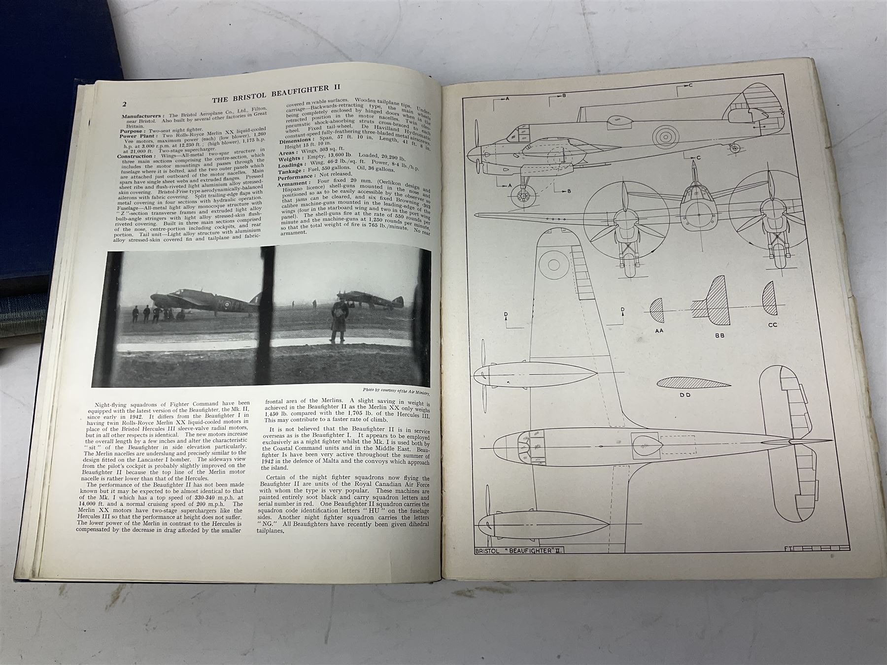 Aircraft of the Fighting Powers. Five volumes. 1940-44 including two copies of volume three; Royal Air Force Flying Review. Six volumes. 1956-63. Uniformly bound in blue cloth with gilt RAF crest to front covers; and ten other books of aircraft and aeronautica interest.
