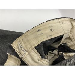 Pair of WW2 German Other Ranks trousers c1940-42, stamped C.& A. Brenninkmeyer Workstatten; WW2 German Army webbing belt with steel 'Gott Mit Uns' buckle; and WW2 German leather belt with 'Stahlhelm' (Steel Helmet League) members buckle (3)