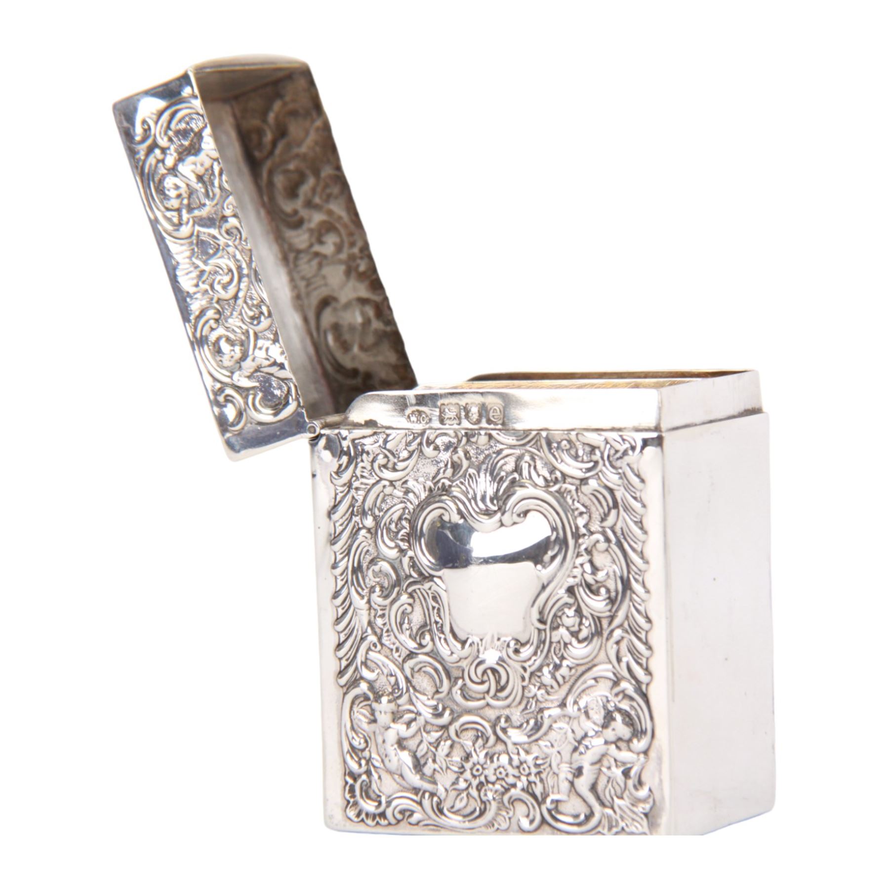 Late Victorian silver playing card box, of rectangular form with hinged top, the front and back embossed with vacant cartouche, surrounded by putti, foliate scrolls and C scrolls, hallmarked William Comyns & Sons, London 1900, H7.5cm W5.5cm D3.5cm
