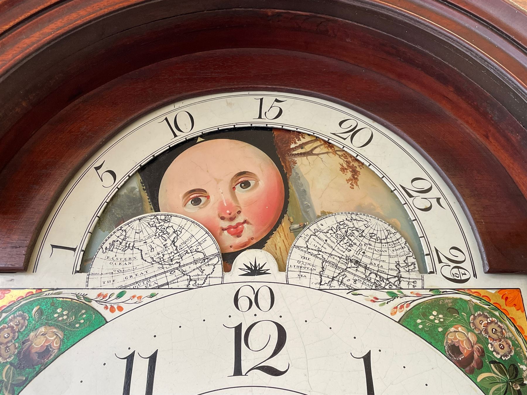 John Bancroft of Scarborough - a fine late George III 8-day mahogany longcase clock, with an elaborate pagoda pediment, brass ball and eagle finials and oval conch shell inlay, break arch hood door flanked by reeded pilasters with brass Corinthian capitals, trunk with inlaid canted corners and a break arch trunk door with 