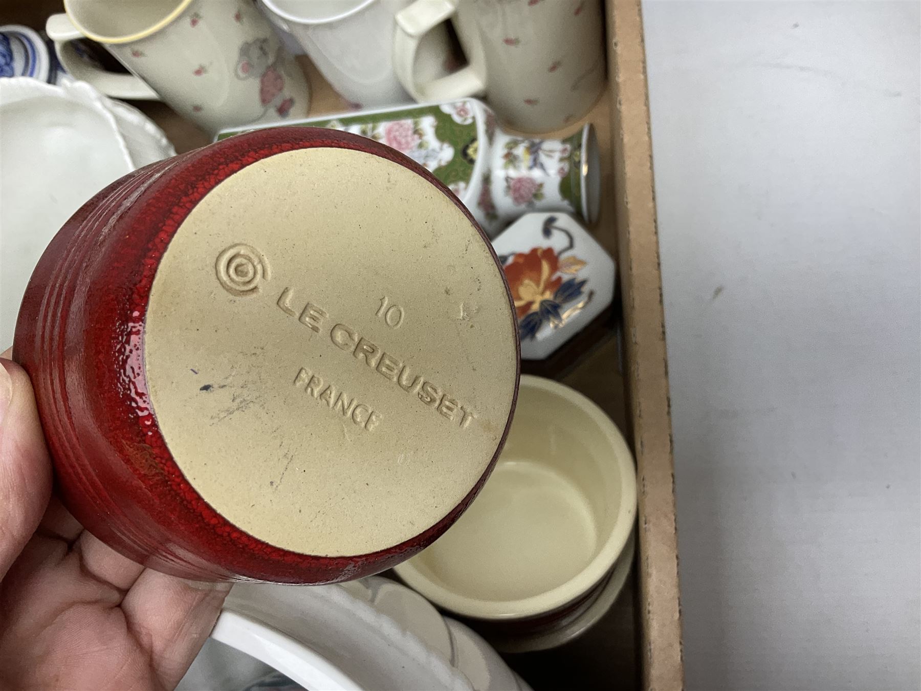 Doulton Lambeth Slaters vase of baluster form decorated with flowers, Chinese ginger jar in the form of a pumpkin, three Le Creuset red ramekins, Hornsea, Paragon Athena pattern tea wares, jardinière and other ceramics in two boxes 